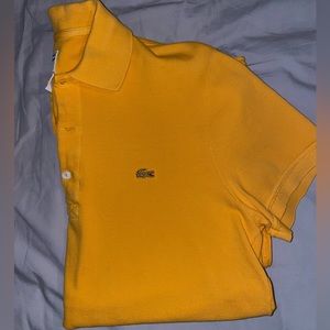 Lacoste men’s distressed polo in gold